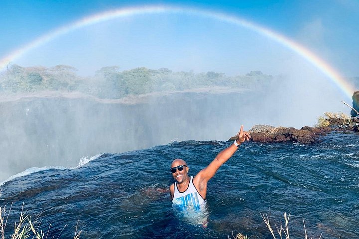 Small group devils pool rhino in Victoria Falls